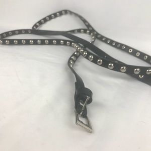 Long thin black circle studded belt